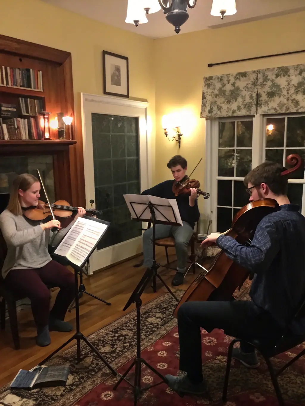 A photograph of a past BANDE DU PARADOU event, showcasing a classical music concert held in a historic church, with musicians playing string instruments and the audience listening attentively.